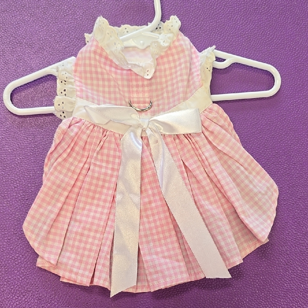 Pink and White Dog Clothing with Bow and Flared Design